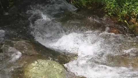 Graceful Cascade Waterfall Over Rock Steps in Barskoon Gorge, Kyrgyzstan Stock Footage 306617173