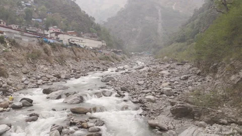 The Graceful Flow of a Mountain River 스톡 동영상 275046912