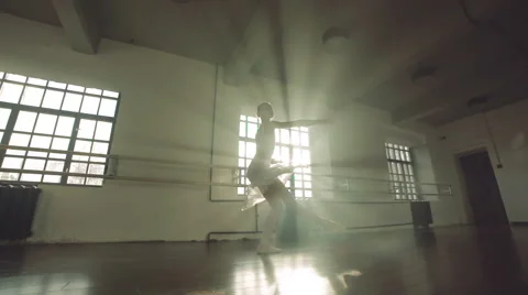 Graceful girl practicing ballet in the Studio, slow motion , performs the Stock-Footage 56747925