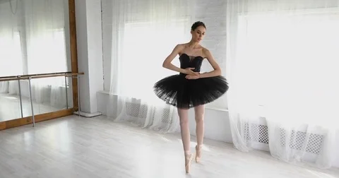 Graceful girl practicing ballet in the Studio Stock Footage 75098059