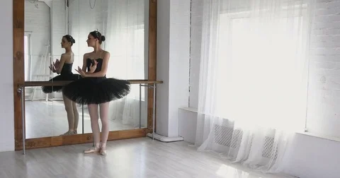 Graceful girl practicing ballet in the Studio Stock Footage 75125567