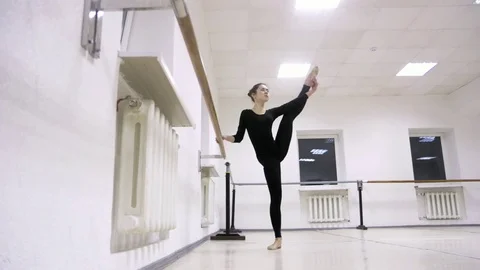 Graceful girl practicing ballet in the Studio, slow motion , does pirouettes 스톡 동영상 75315082