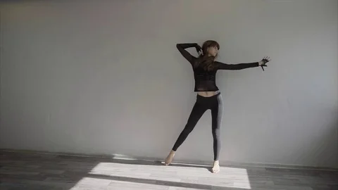 Graceful girl practicing contemp in studio, she performing the elements of dance Stock Footage 70780262