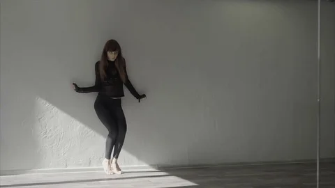 Graceful girl practicing contemp in studio, she performing the elements of dance Stock Footage 70780931