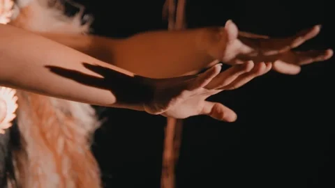 Graceful Hand Movements in Dramatic Lighting Video stock 280492243