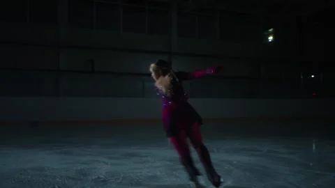 Graceful Lady Skating Alone In Darkness, Sportswoman Preparing To Competition Stock Footage 254117232