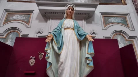 A graceful statue of the Virgin Mary Stock Footage 320400430