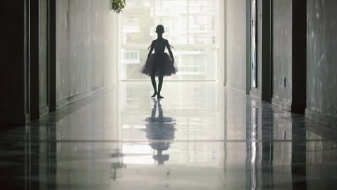 Graceful Young Ballet-dancer Dancing Classical Ballet in Dark Hallway. Stock Footage 145312283
