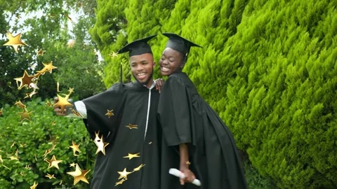 Grad couple pulling phone, posing for graduation selfies holding diplomas, Stock Footage 333602223