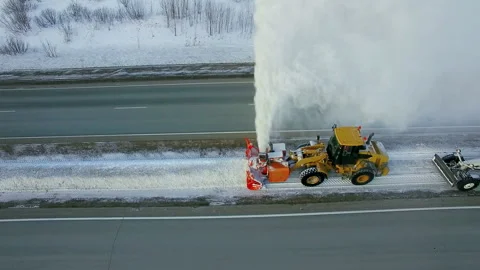 Grader clean remove snow, snowplow, snow blower, blast snowfall, winter, road Stock Footage 85684655