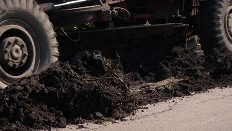 A grader cuts a layer of soil Stock Footage 115018831