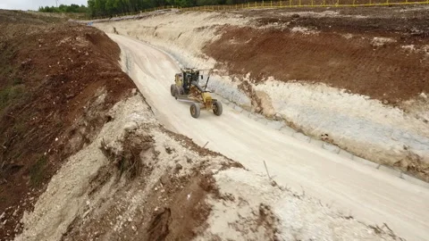 Grader is driving down the road Stock Footage 170929752