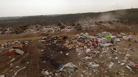 Grader at the dump Stock Footage 70178084