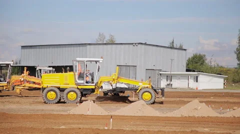 Grader industrial machine create a flat surface during the grading process Stock Footage 68146889