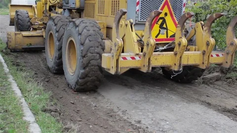 Grader leveled soil on the road Stock Footage 72741185