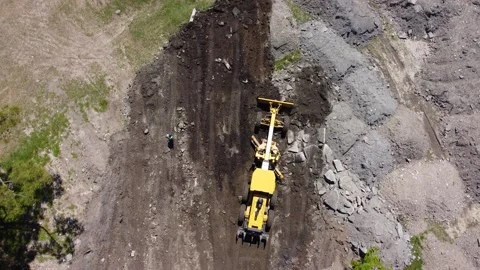 Grader is leveling the ground Stock Footage 168618744
