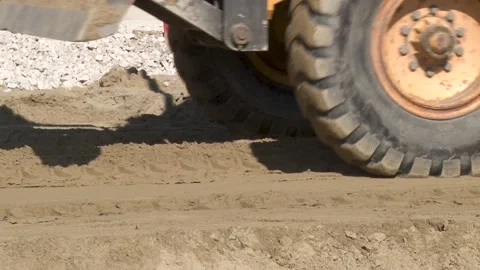 Grader is leveling ground, working at construction of new road. Stock Footage 234139863