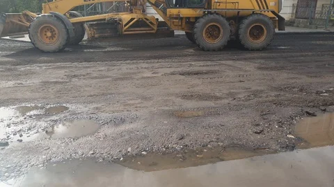 Grader makes the road. Work on the grader. Stock Footage 114243956