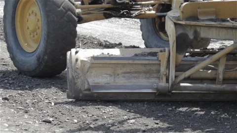 The grader passes the road Stock Footage 87839258