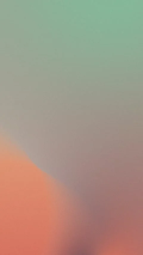 Gradient background in muted orange and green tones. Seamless loop, 4K. Stock Footage 309856162