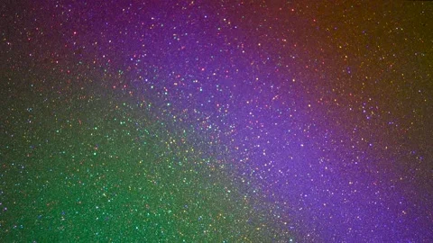 Gradient background in orange and green colors. A beam of light blue flashes. Stock Footage 233503437