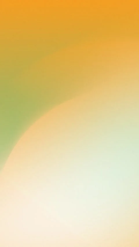 Gradient background with soft orange, green, and ivory hues. Blurred pastel 库存影片 310143581