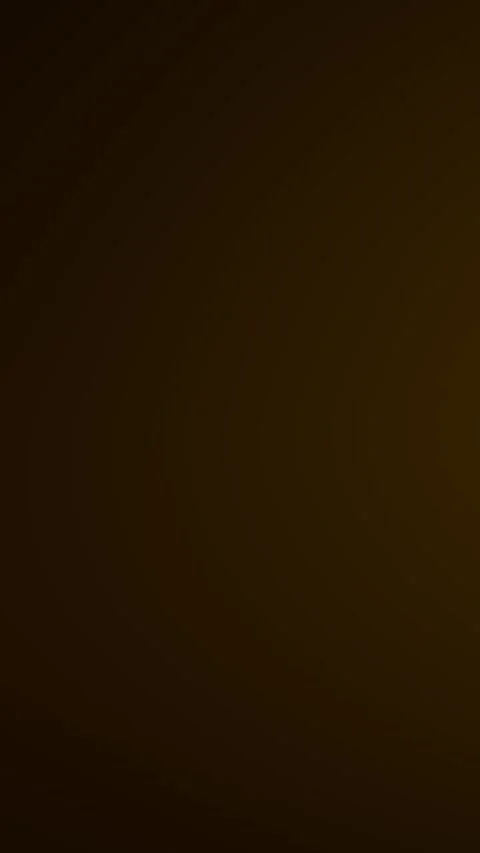 Gradient background transitions from dark brown to yellowish tones Stock Footage 328567929