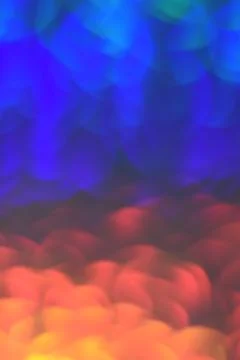 Gradient blue and red glitter festive background with bokeh lights. Foto stock