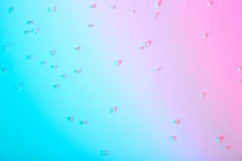 Gradient from blue to pink tint background with fallen white petals of cherry or Stock Photos