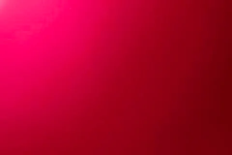 Gradient crimson colored paper background. Stock Photos