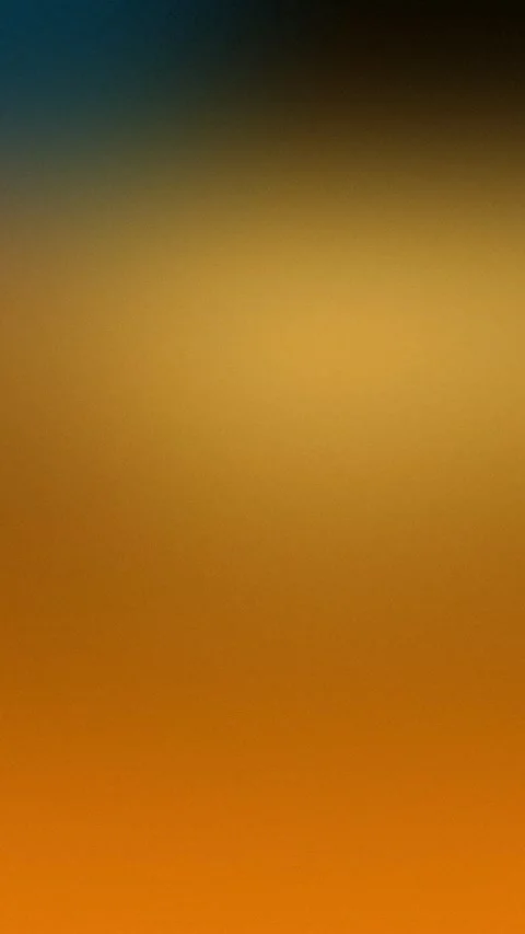 Gradient with dark blue transitioning to warm orange, smooth seamless loop Stockbeeldmateriaal 309701599