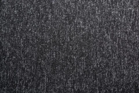 Gradient dark gray background with textile texture. Stock Photos