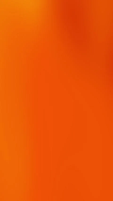 Gradient dark orange creates a plain orange vertical background. Vidéo 306103046
