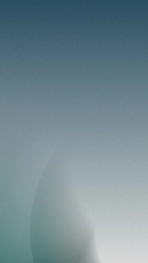 Gradient fade with blue and gray tones creating a soothing background. Seamless 動画素材 309855955