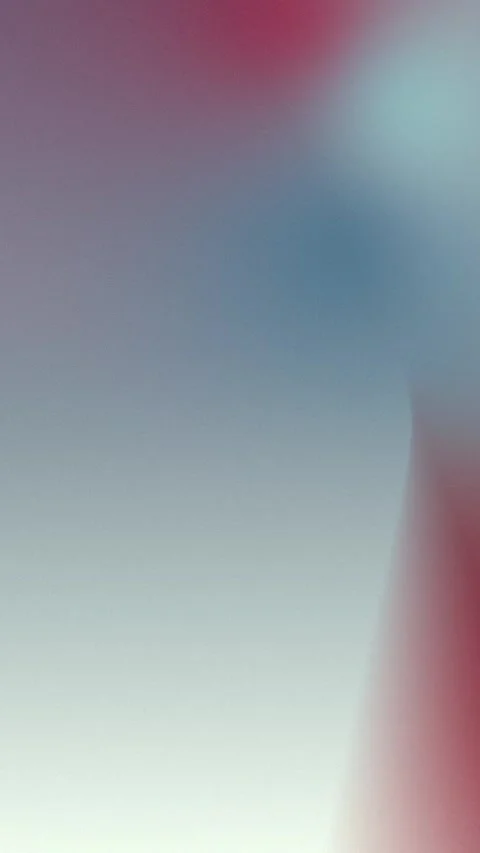 Gradient hues of pink, blue, and teal blend seamlessly in a soft 4K loop. Stock Footage 305344853