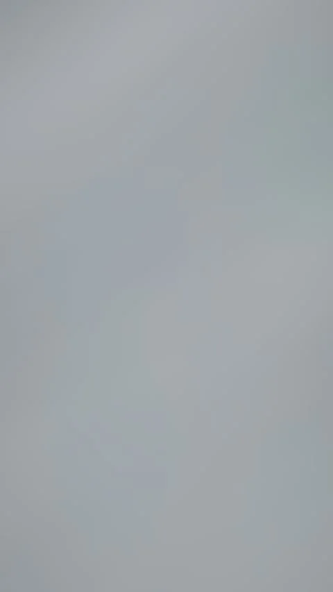 Gradient light streaks ripple in gentle wave motion Video stock 330059405