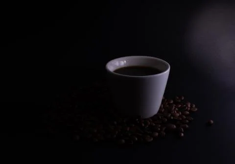 Gradient lighting mugs on a dark background with low light Stock Photos