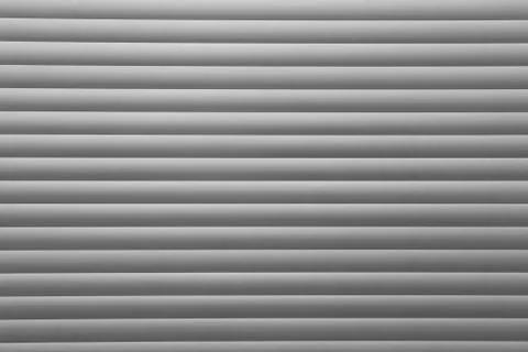 Gradient line pattern of aluminium roller shutter door abstract for backgroun Stock Photos