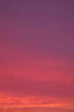 Gradient Magenta Cloud Layer with Sunset Afterglow for Abstract Background Stock Photos