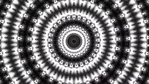 Gradient motion that forms a circle ornament pattern in black and white colors Stock Footage 246205411