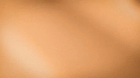 Gradient orange brown textured background 4K abstract grainy wallpaper tech.. Stock Photos