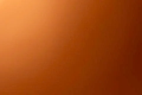 Gradient orange colored paper background. Stock Photos