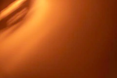 Gradient orange colored paper background. Stock Photos