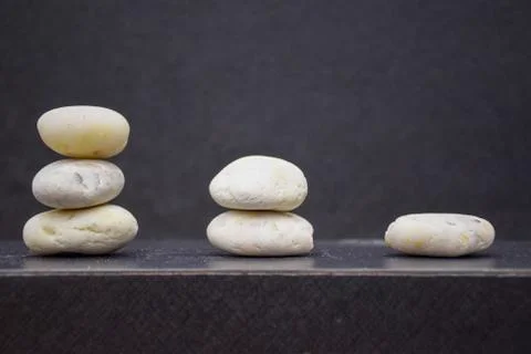 Gradient stones on table with copy space and blur background Stock Photos