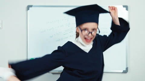 Graduate dancing. Student 7-8 years in the mantle Stock Footage 64860045