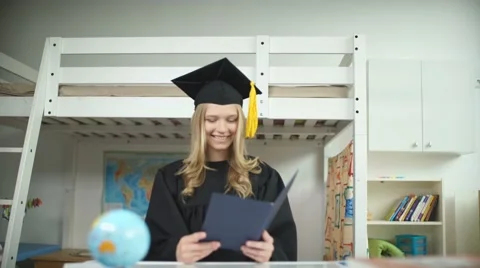 A graduate in the Master's cap and gown. Diploma of Higher Education Stock Footage