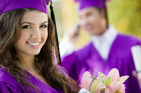 Graduate Student With Flower Bouquet Stock Photos