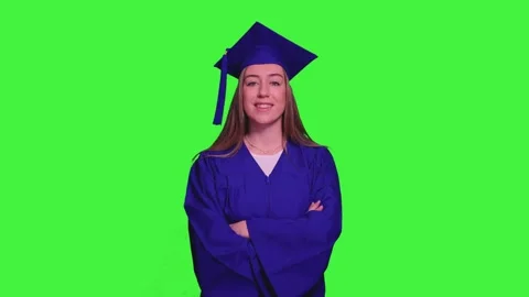 Graduated student posing with arms crossed on green screen Stock Footage 302401480