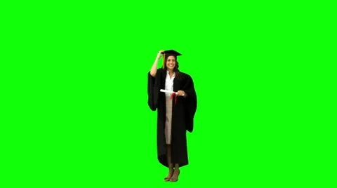 Graduated student in slow motion throwing her hat Stock Footage 10815831