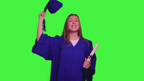 Graduated student throwing graduation cap on green screen Stock Footage 302401478